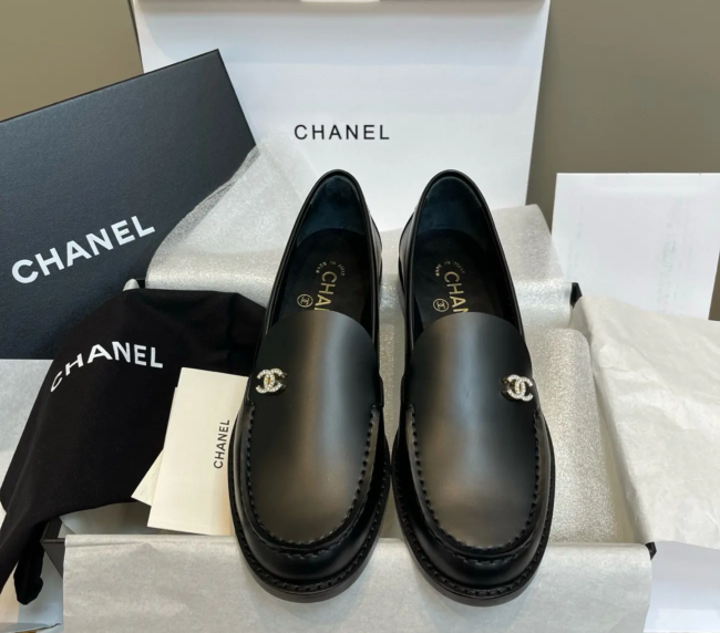 Chanel 2025 loafers or slingback lace-up shoes with specific features