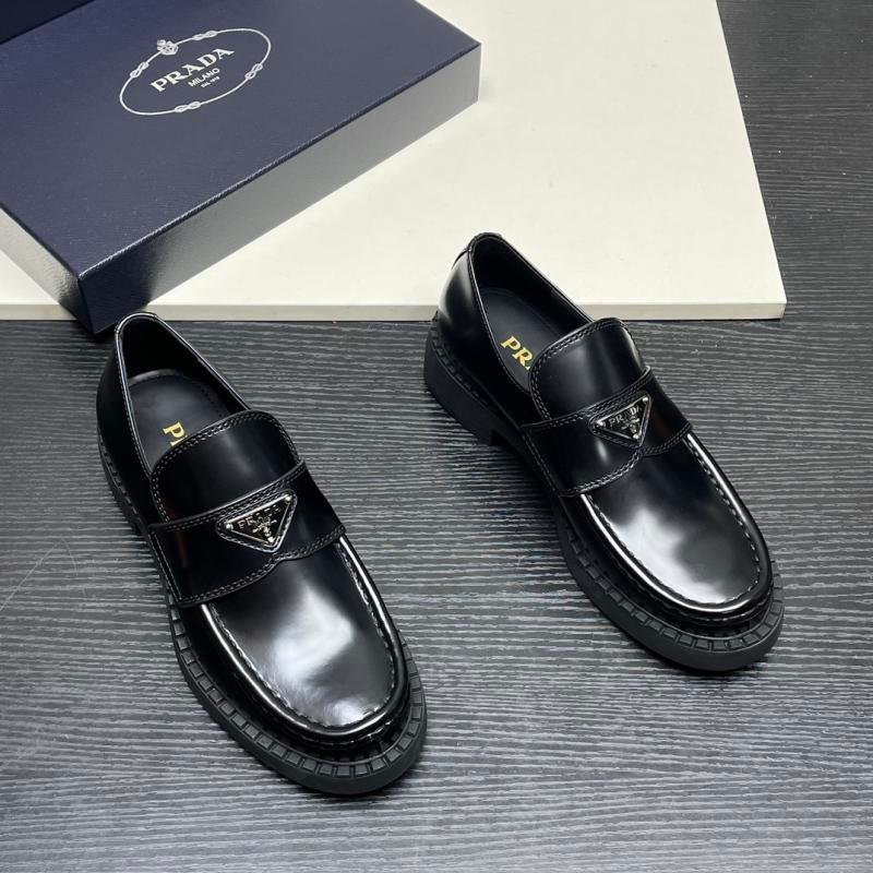 The new Prada triangle logo shoes in light male leather