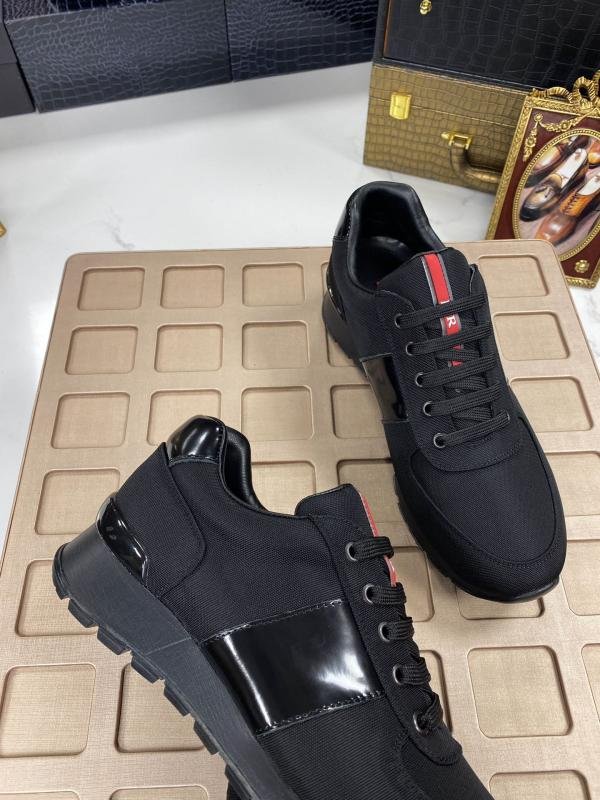 1749460874 202 Damped black sneakers for men from Prada