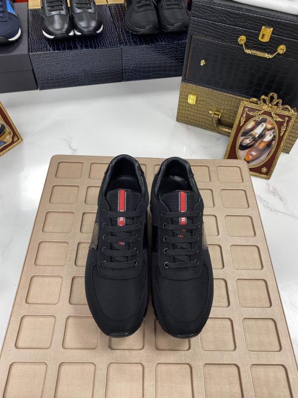 Damped black sneakers for men from Prada