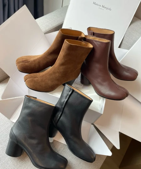 Maison Margiela MM6 split-toe ankle boots with a chunky heel. (1)