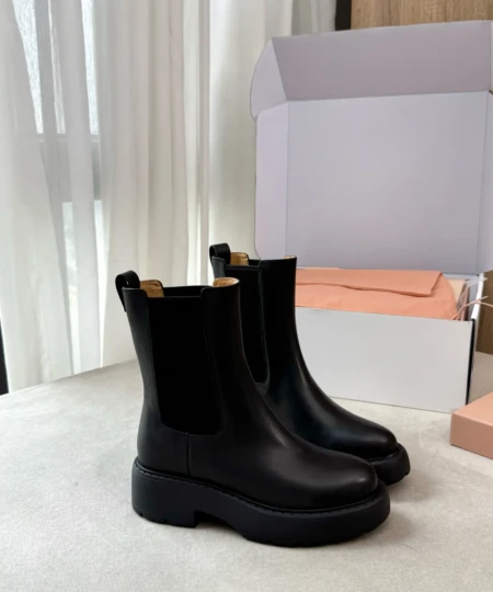 Miu Miu's latest fallwinter collection thick-soled, height-enhancing slip-on elasticated Martin boots (3)