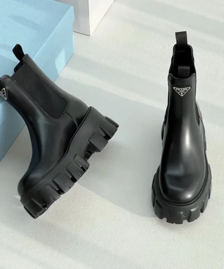 Prada's new thick-soled Chelsea boots with a sawtooth triangle logo (5)