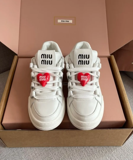 MiuMiu platform shoes accessorized with this year's limited-edition Valentine's Day heart charm (1)