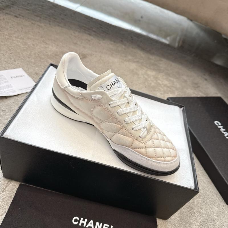 CHANEL Chanel 25B Black and white panda colored tennis shoes in diamond lambskin